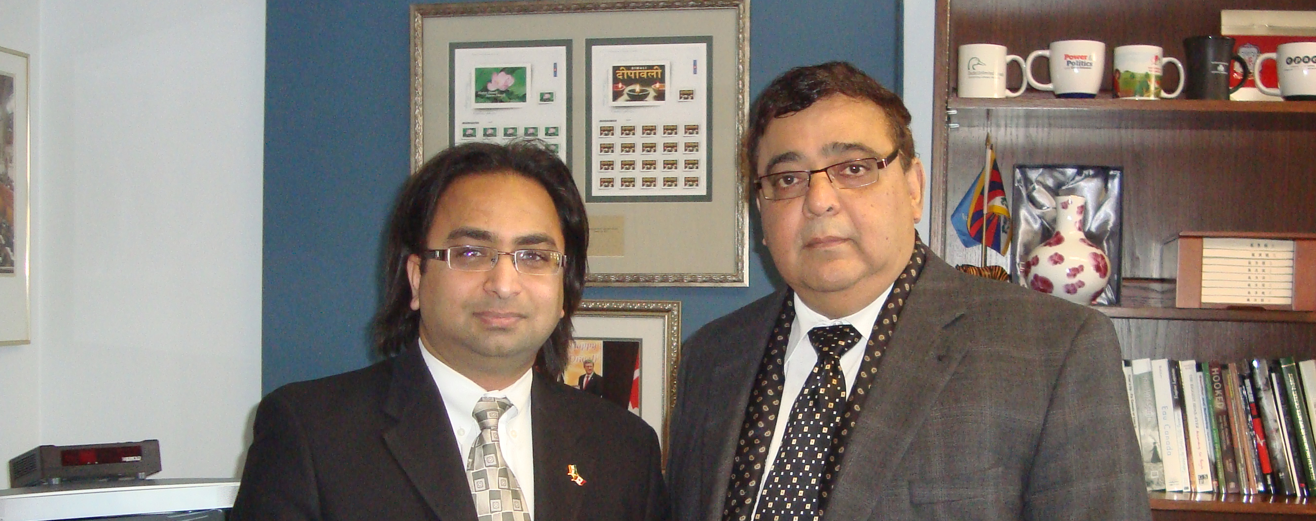 Husain (L) with Hon. Deepak Obhrai, Parliamentary Secretary to the Minister of Foreign Affairs Husain (L) with Hon. Deepak Obhrai, Parliamentary Secretary to the Minister of Foreign Affairs