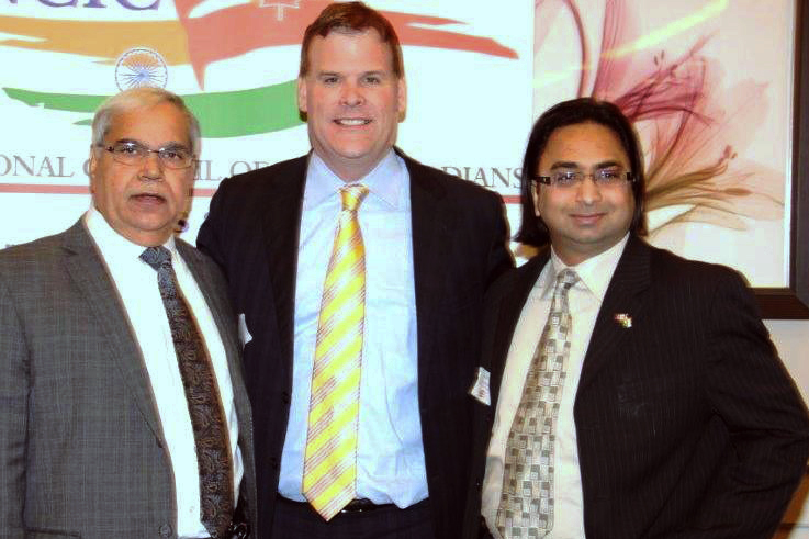 Kam Rathee, Hon. John Baird, and Husain Neemuchwala Kam Rathee, Hon. John Baird, and Husain Neemuchwala
